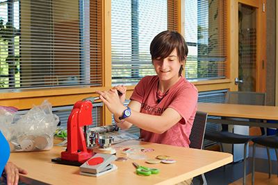 A girl making crafts.